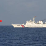 China Coast Guard vessel shadowing a Philippine ship in the West Philippine Sea