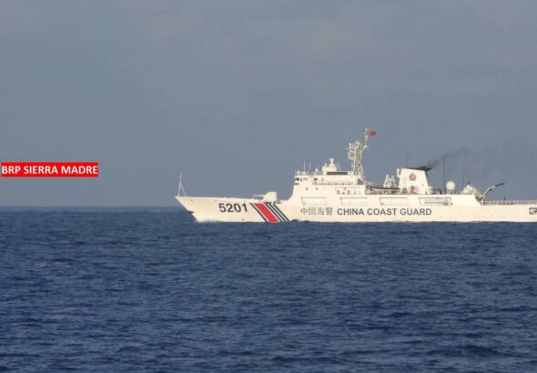 China Coast Guard vessel shadowing a Philippine ship in the West Philippine Sea