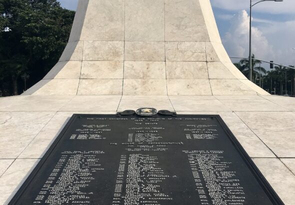 Independence Flagpole at Rizal Park in Manila with Philippine flag