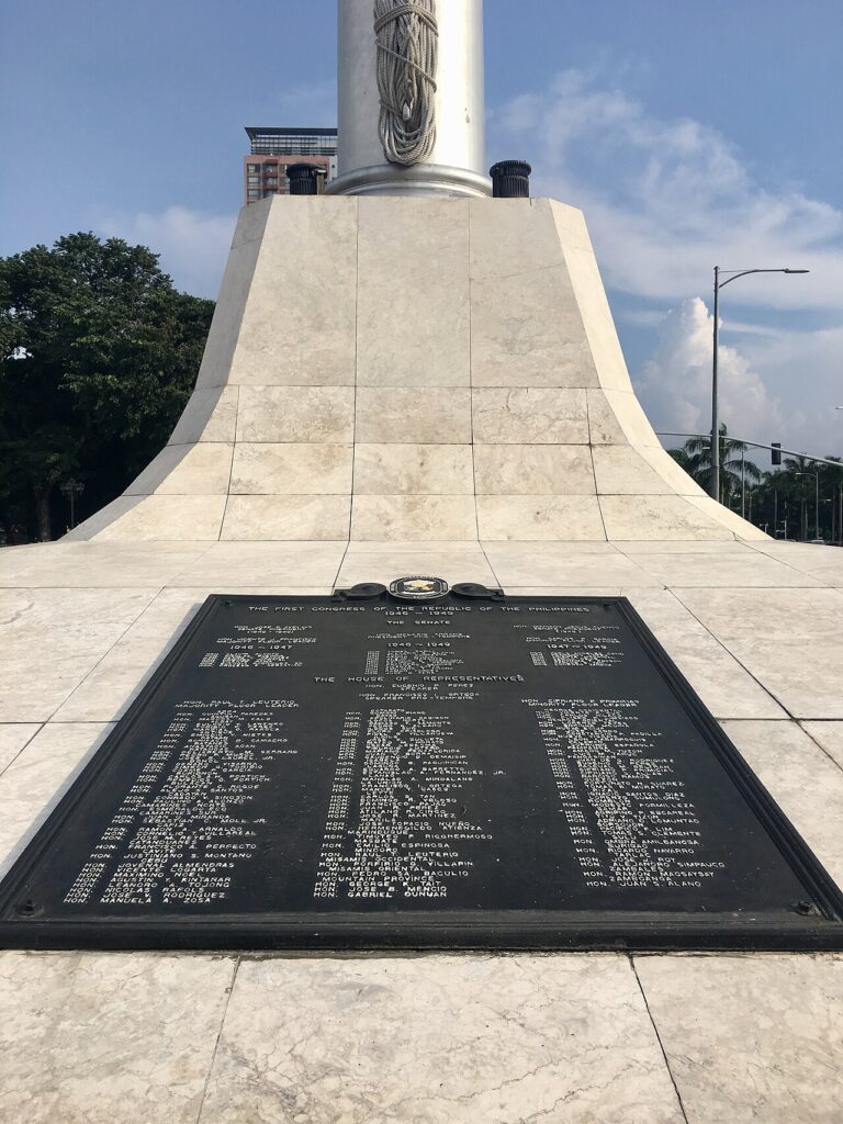 Independence Flagpole at Rizal Park in Manila with Philippine flag