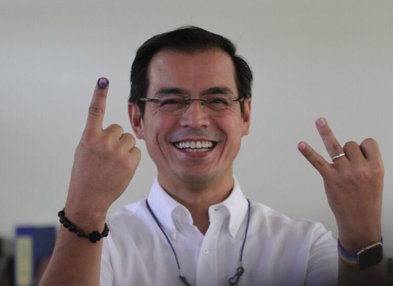 Voter shows inked finger after casting ballot in Philippine elections