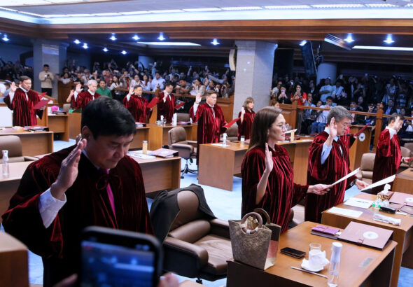 Philippine senators taking oath as impeachment court judges