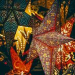 Parol-style star lanterns glowing for the holiday season