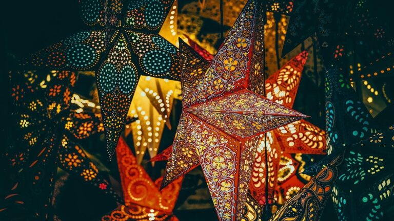 Parol-style star lanterns glowing for the holiday season