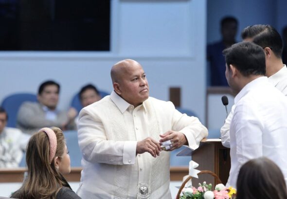 Senator Ronald 'Bato' dela Rosa in a barong inside the Senate session hall of the Philippines