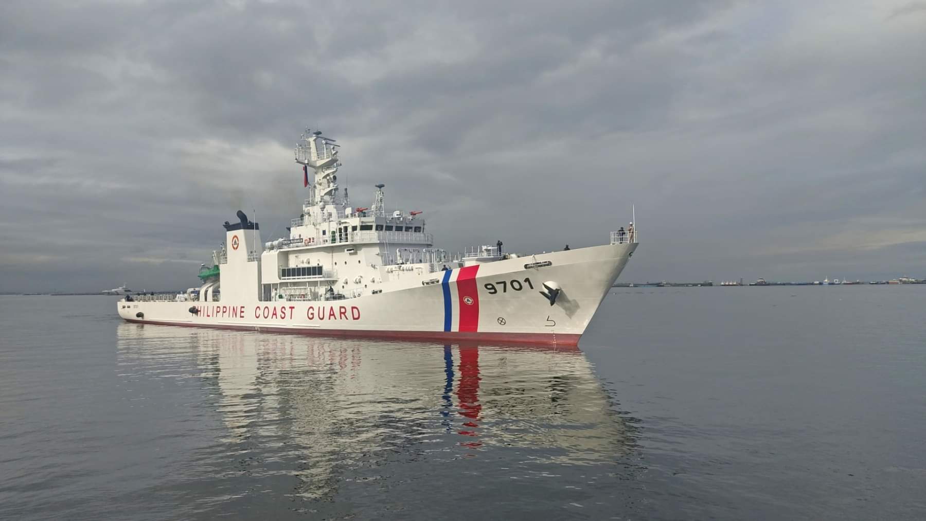 Philippine Coast Guard vessel BRP Teresa Magbanua (MRRV-9701) at sea under a cloudy sky